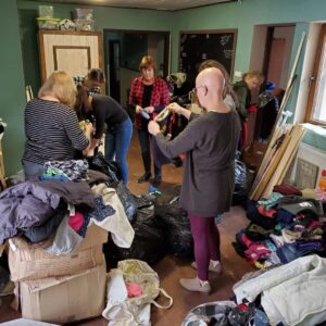 Sorting through clothing for those we serve, 2019.